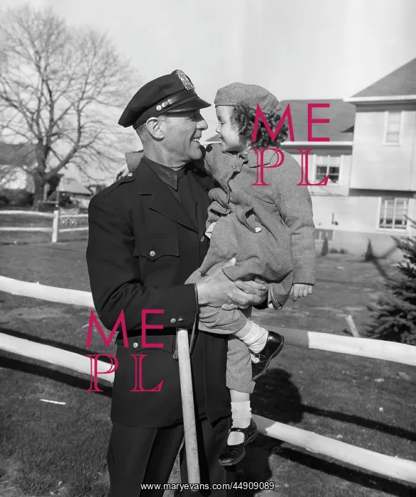: Policeman Carrying Young Girl : Policeman Carrying Young Girl