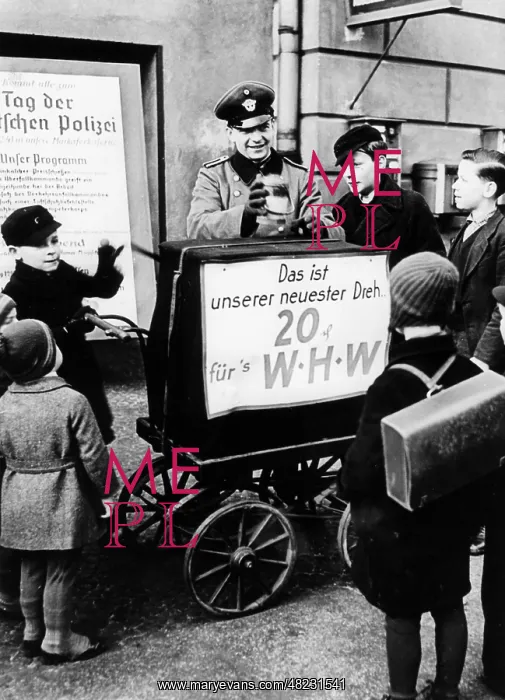: Policeman collecting donations, 1942 / 1943 : Policeman collecting donations, 1942 / 1943