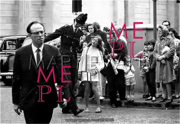 : POLICEMAN DIRECTS GIRL : POLICEMAN DIRECTS GIRL