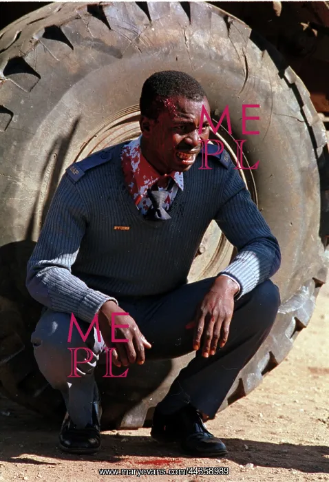 : Policeman is hit by a brick : Policeman is hit by a brick