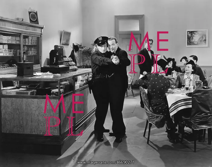 : Policeman and a man dancing a tango in a restaurant : Policeman and a man dancing a tango in a restaurant