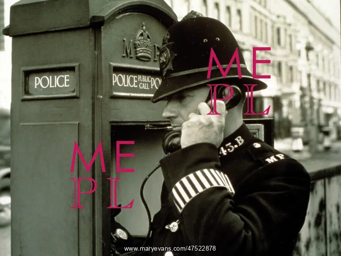 : Policeman at a police call box : Policeman at a police call box