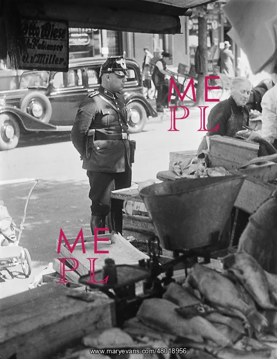 : Policeman at a weekly market in Berlin, 1938 : Policeman at a weekly market in Berlin, 1938
