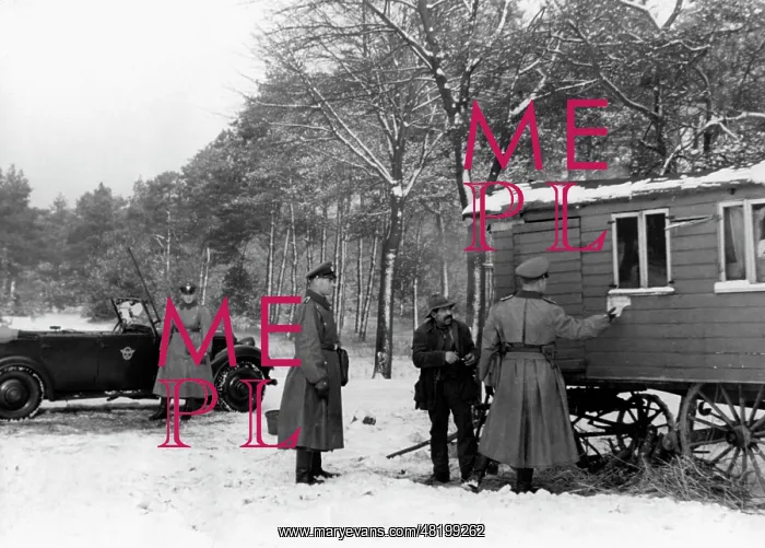 : Policemen controlling a gypsy, 1939 : Policemen controlling a gypsy, 1939