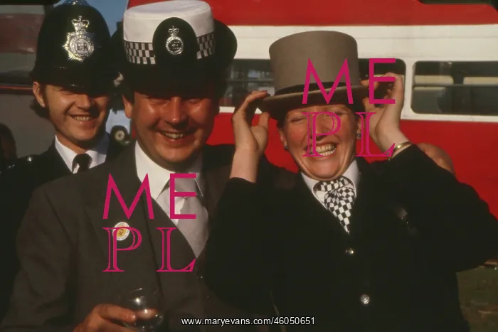 : Policewoman wears punter's hat : Policewoman wears punter's hat
