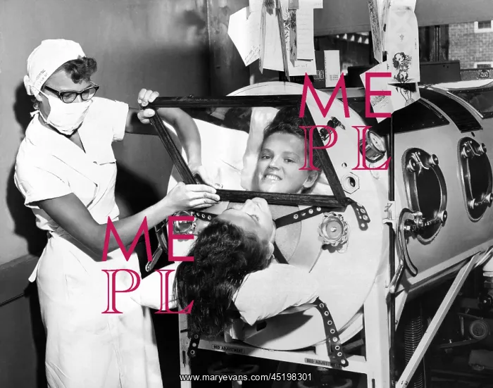 : Polio patient Flossie Rogers looking at ? : Polio patient Flossie Rogers looking at ?