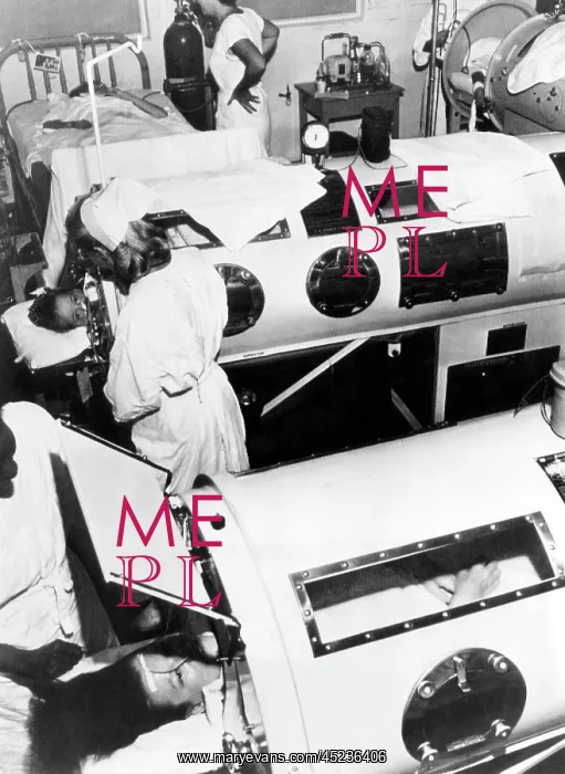 : Polio patients being treated with iron lungs ? : Polio patients being treated with iron lungs ?