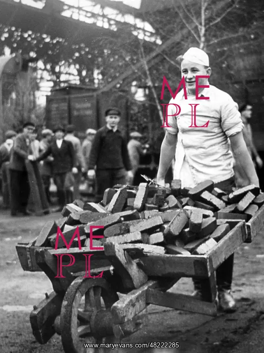 : Political leader transporting coal, 1939 : Political leader transporting coal, 1939