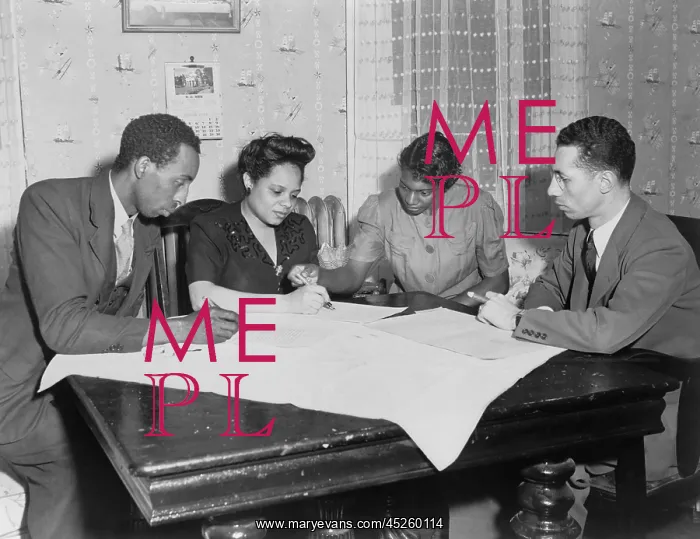 : Polly Johnson (2nd from right) is assisted in : Polly Johnson (2nd from right) is assisted in