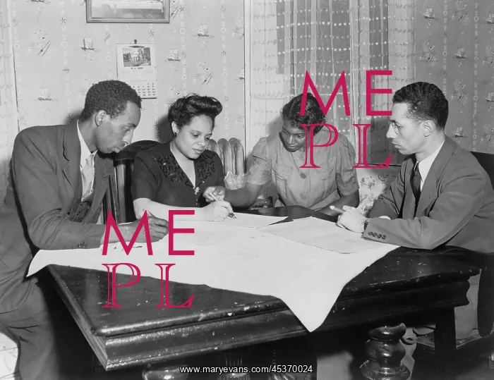 : Polly Johnson (2nd from right) is assisted in signing : Polly Johnson (2nd from right) is assisted in signing