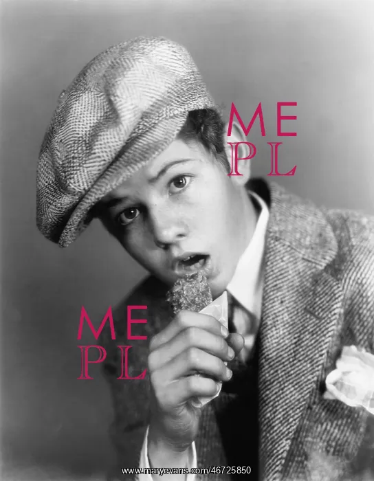 : Portrait of a boy with a hat eating a candy bar : Portrait of a boy with a hat eating a candy bar