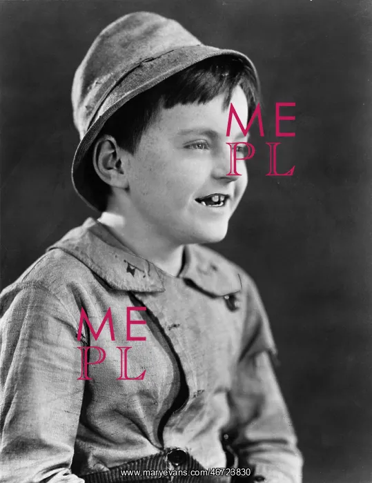 : Portrait of a boy in a hat and grinning : Portrait of a boy in a hat and grinning
