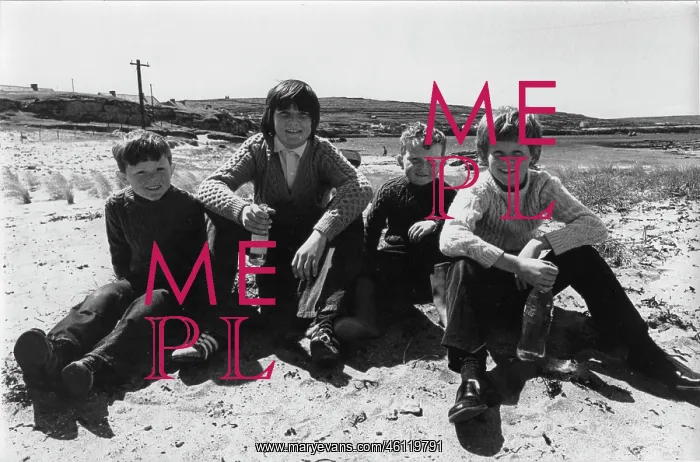 : Portrait of four boys on a beach : Portrait of four boys on a beach