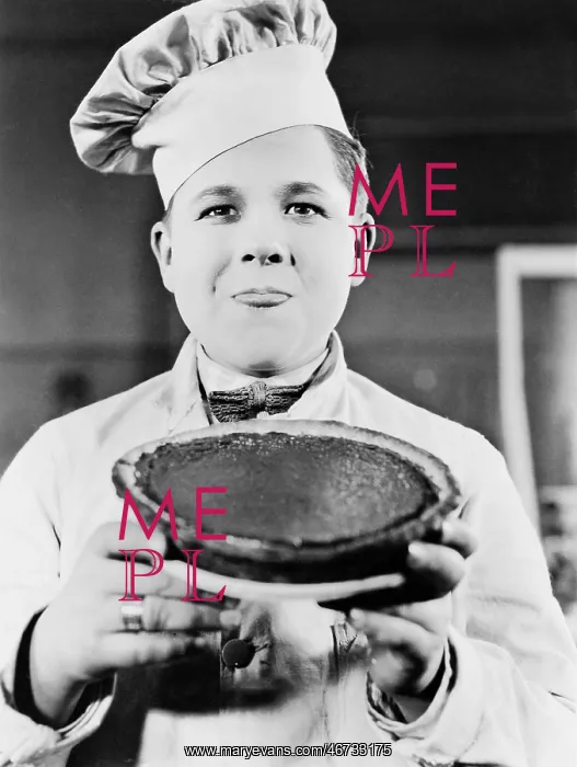 : Portrait of chef with pie : Portrait of chef with pie