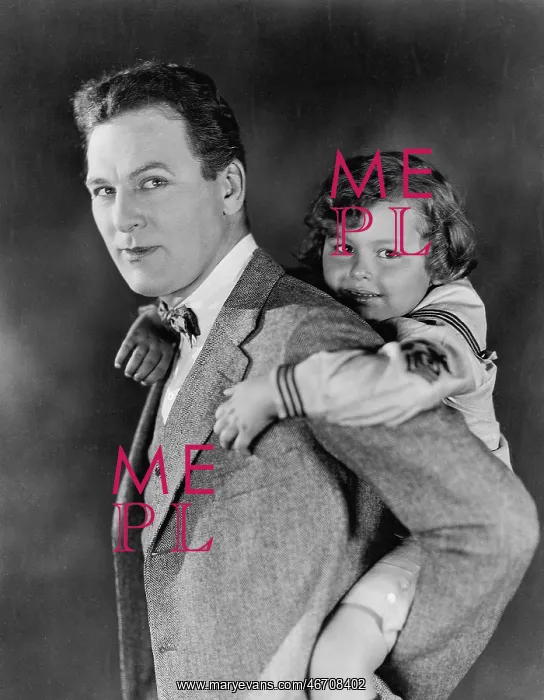 : Portrait of dad carrying son on his back : Portrait of dad carrying son on his back