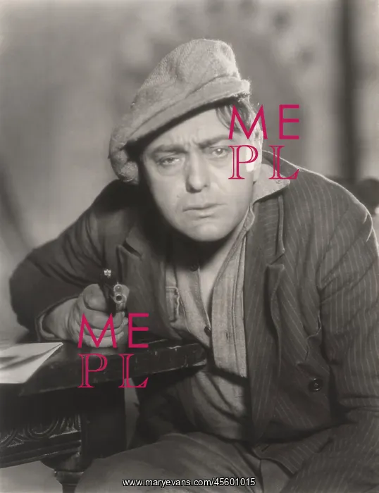 : Portrait of despondent man pointing gun : Portrait of despondent man pointing gun