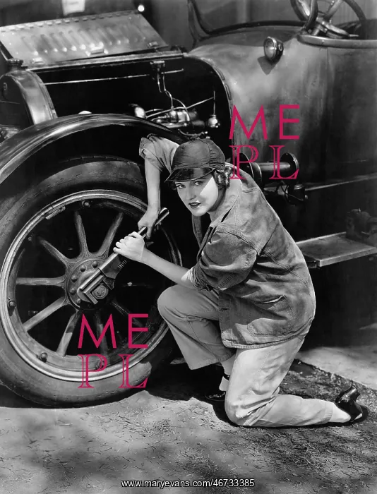 : Portrait of female mechanic working : Portrait of female mechanic working