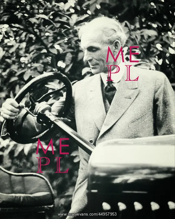 : Portrait of Henry J. Ford Holding Steering : Portrait of Henry J. Ford Holding Steering