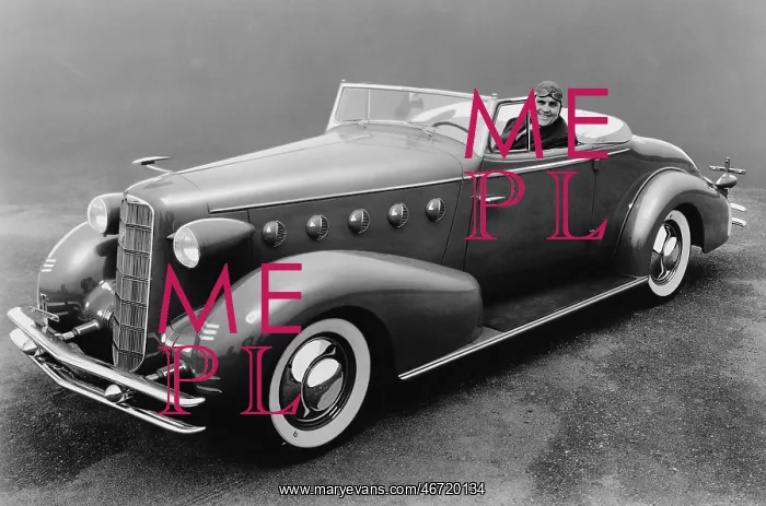 : Portrait of man in antique car : Portrait of man in antique car