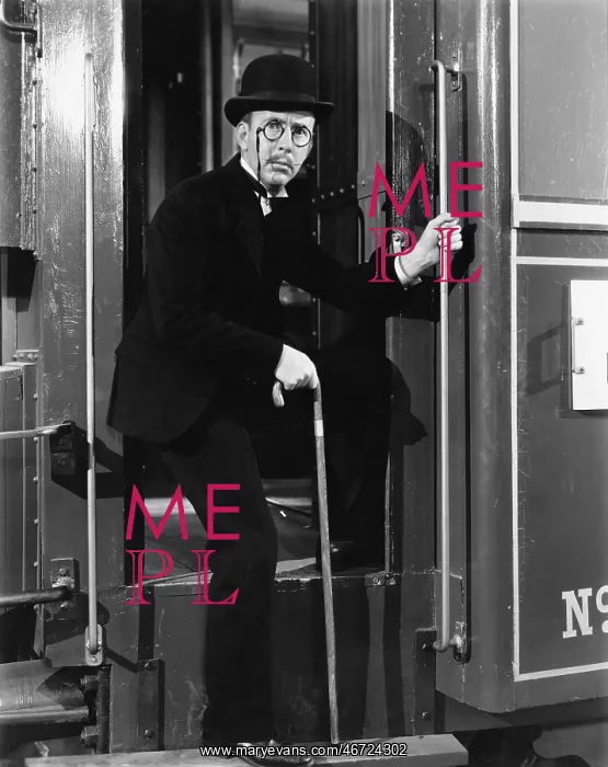 : Portrait of a man debarking a train : Portrait of a man debarking a train