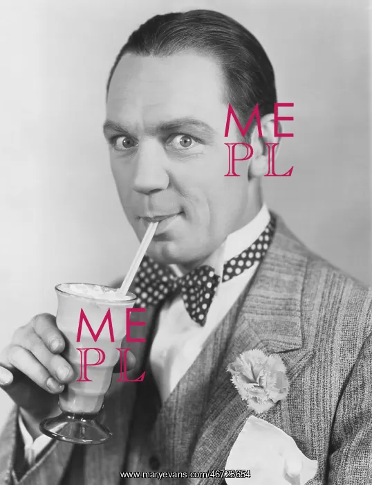 : Portrait of man drinking through straw : Portrait of man drinking through straw