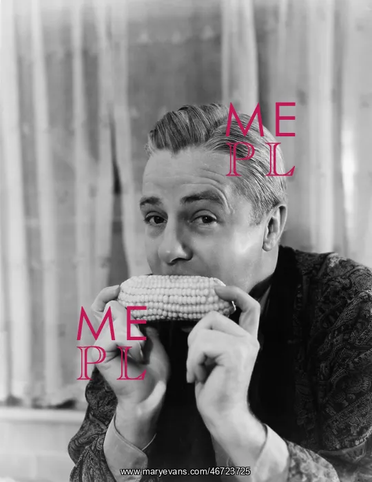 : Portrait of a man eating a corn cob : Portrait of a man eating a corn cob