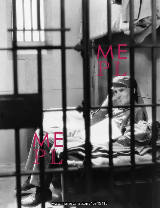 : Portrait of man in jail : Portrait of man in jail