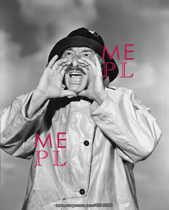  : Portrait of man in raincoat yelling