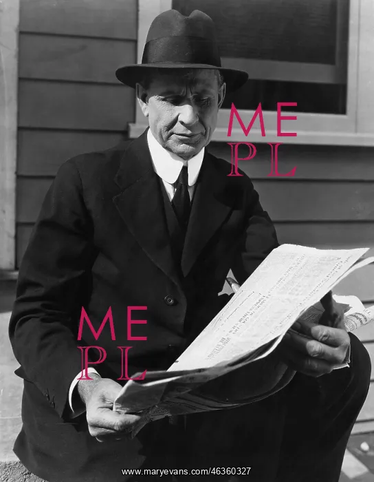 : Portrait of man reading newspaper : Portrait of man reading newspaper