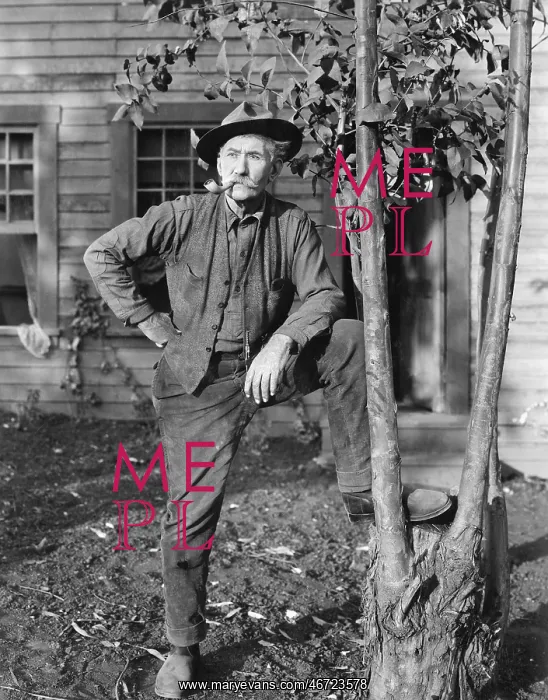 : Portrait of man smoking pipe outside : Portrait of man smoking pipe outside