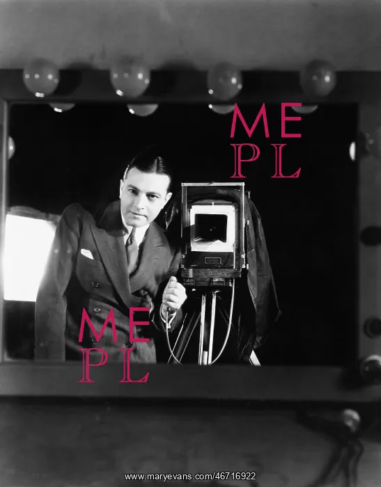  : Portrait of a man standing with a large format camera