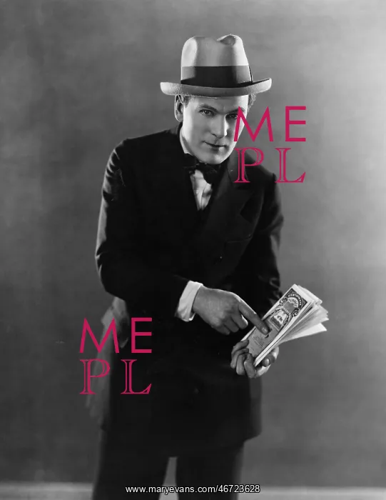 : Portrait of man with stock certificates : Portrait of man with stock certificates