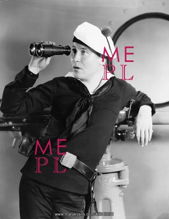 : Portrait of sailor looking through binoculars : Portrait of sailor looking through binoculars