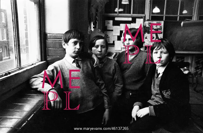 : Portrait of four schoolboys in a classroom : Portrait of four schoolboys in a classroom