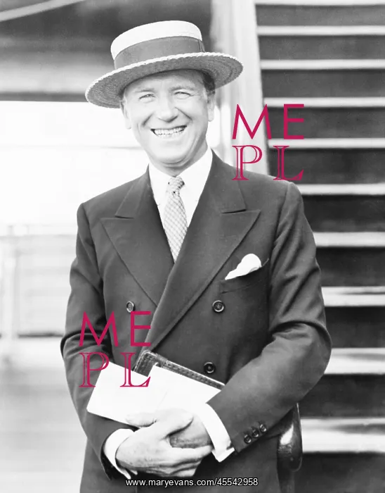 : Portrait of a smiling man with a straw hat : Portrait of a smiling man with a straw hat