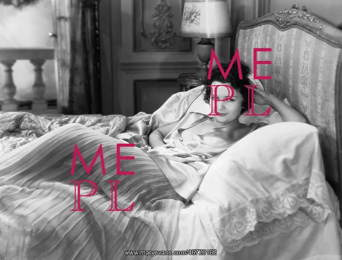  : Portrait of woman in bed