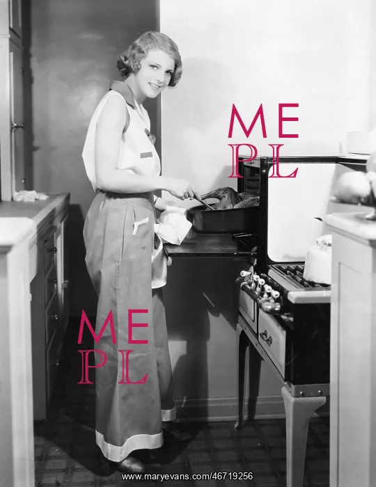 : Portrait of woman cooking : Portrait of woman cooking