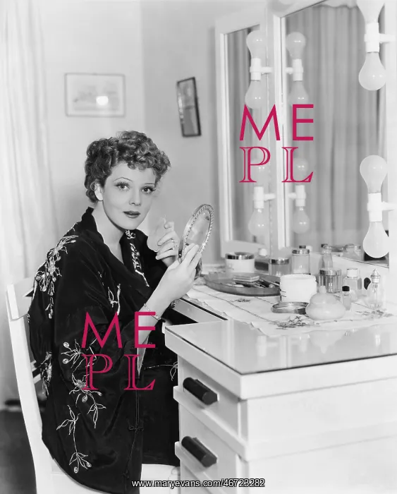 : Portrait of woman at dressing table : Portrait of woman at dressing table