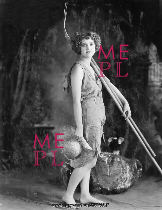 : Portrait of woman with pitchfork and straw hat : Portrait of woman with pitchfork and straw hat
