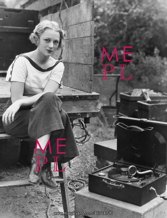 : Portrait of woman with record player : Portrait of woman with record player