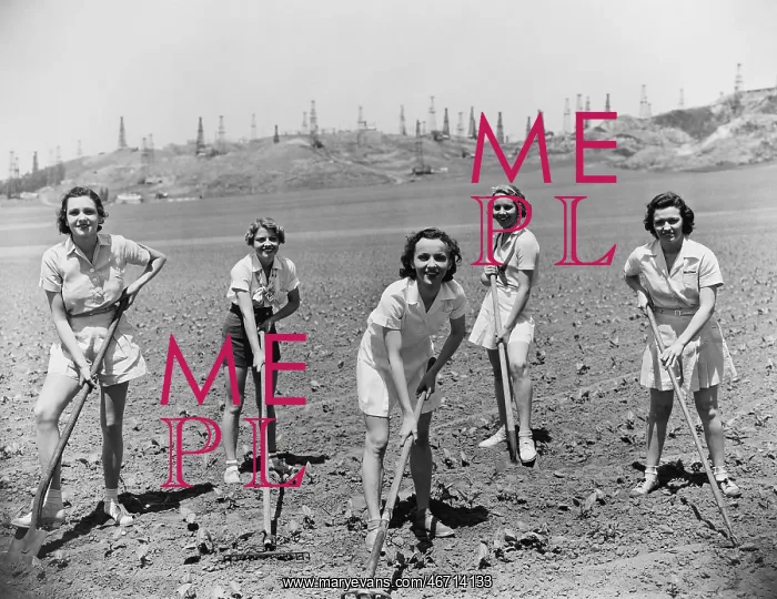: Portrait of women digging in field : Portrait of women digging in field