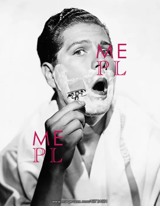  : Portrait of a young man shaving