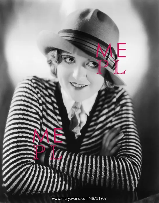 : Portrait of a young woman in a hat smiling : Portrait of a young woman in a hat smiling