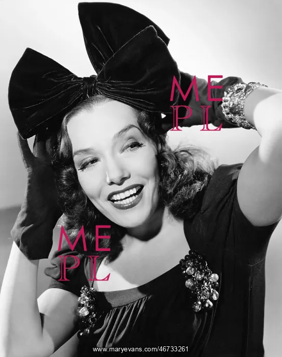 : Portrait of a young woman smiling : Portrait of a young woman smiling