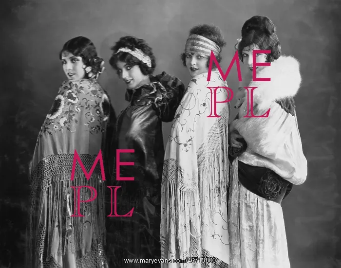 : Portrait of four young women posing in shawls : Portrait of four young women posing in shawls