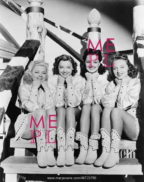 : Portrait of four young women sitting on steps in : Portrait of four young women sitting on steps in