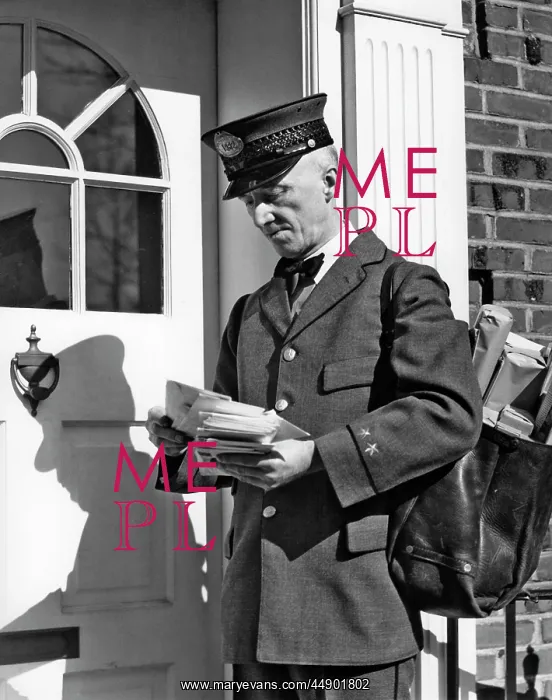 : Postal Service Uniformed Mailman Delivering Mail Standing On : Postal Service Uniformed Mailman Delivering Mail Standing On