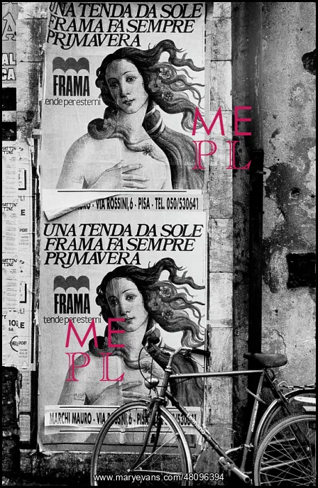  : Posters on wall with bicycle, Pisa, Italy