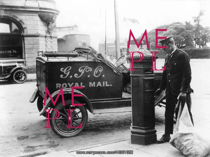 : Postman parked next to postbox : Postman parked next to postbox