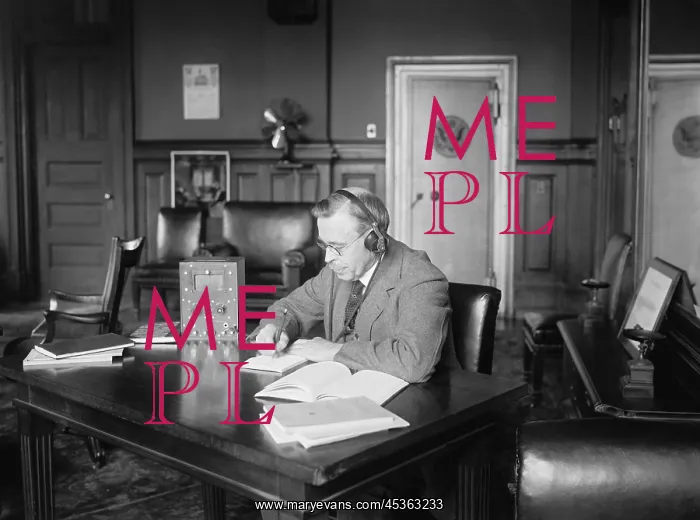 : Postmaster General Hubert Work listening to a radio : Postmaster General Hubert Work listening to a radio